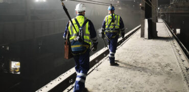 Twor steel workers in a steel plant