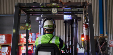 Ternium steel worker driving a forklift